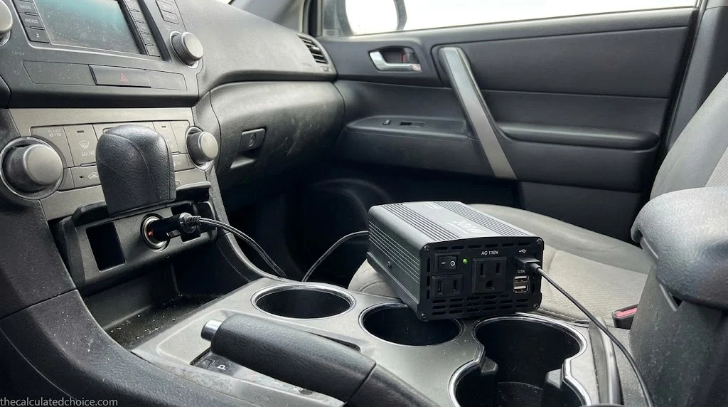 What can a 300W power inverter run: compact power inverter on a car center console connected to the 12V socket